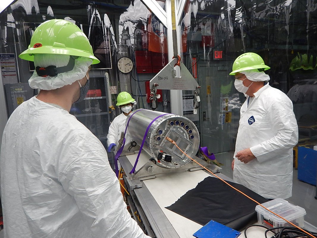 Richard Feder-Staehle, Chi Nguyen, and Rick Evavold of the CIBER-2 team working on the CIBER-2 payload.