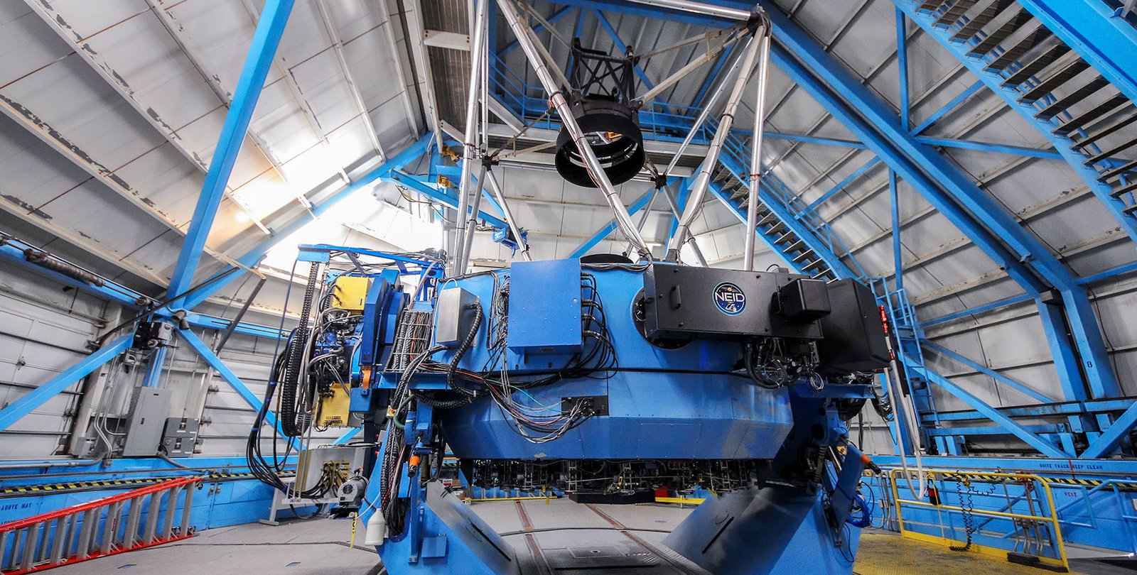 A portion of NEID, called the port adaptor, is seen here on the WIYN telescope.