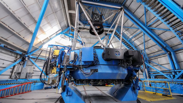 A portion of NEID, called the port adaptor, is seen here on the WIYN telescope.