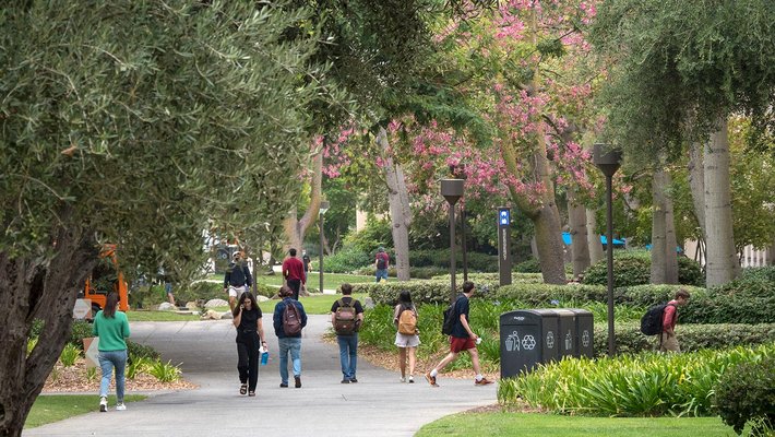 People walking around the Caltech campus.