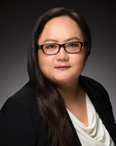 Grace Liang-Franco wearing glasses and back jacket
