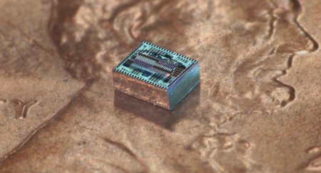 The OPA chip placed on a penny for scale