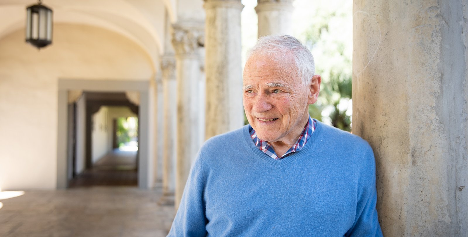 A man in a blue sweater