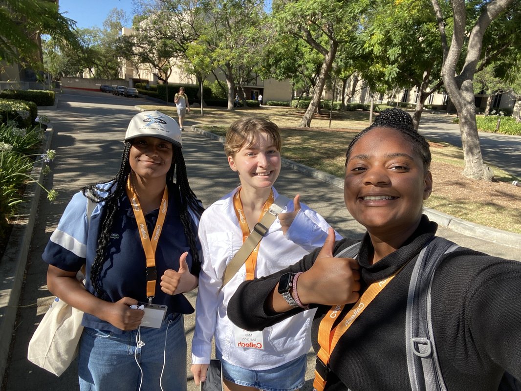 Adoniya Paul, far right, poses with friends at WiSTEM 2023.