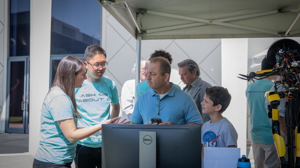 Guests talk to Caltech Science Exchange AI ambassadors.