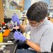 man works in chemistry lab
