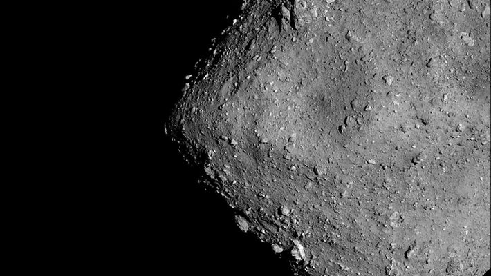Black and white rocky image of asteroid Ryugu