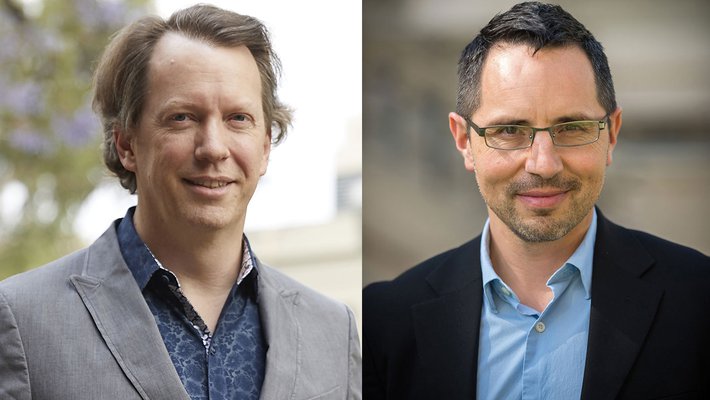 Sean Carroll (left) and Trustee David Chavez (BS '96)