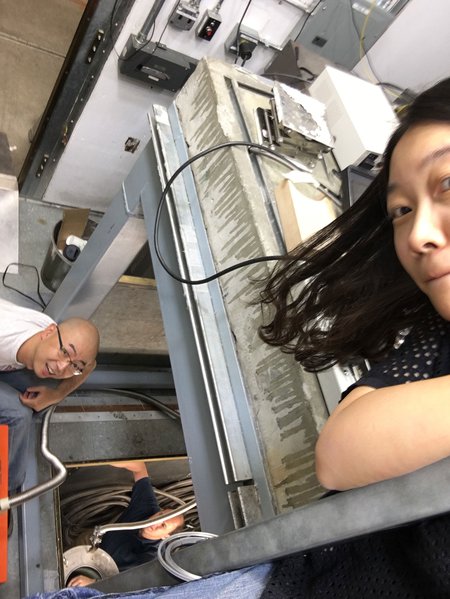 Yejun Feng (left), Yishu Wang (right), and Daniel Silevitch (bottom), are pictured in a lab.