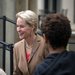 photo of Frances Arnold greeting people at the event
