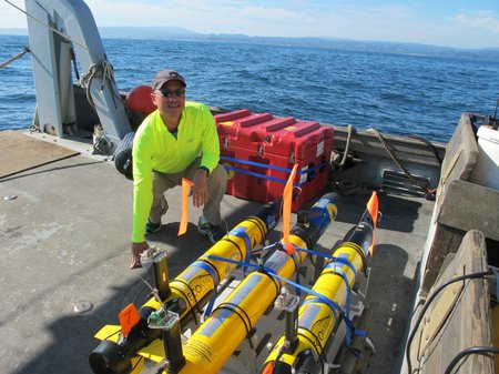 photo of Steve Chien with drones