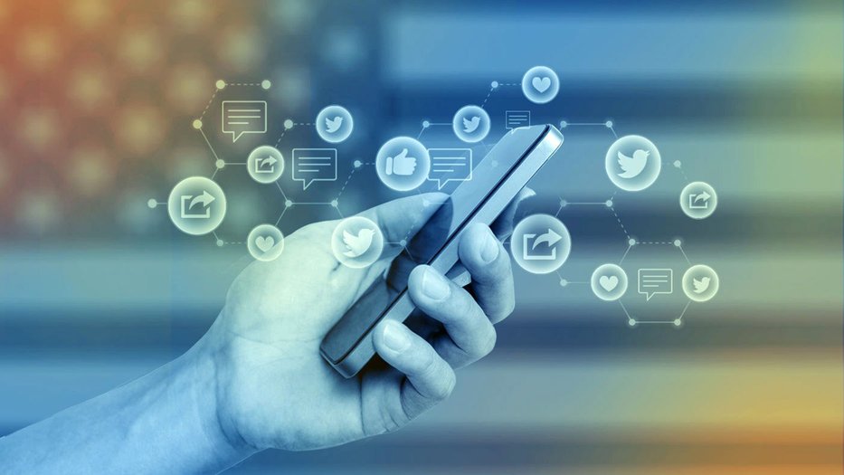 phone with social media icons in hand