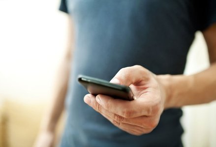 Close up of a person using mobile phone