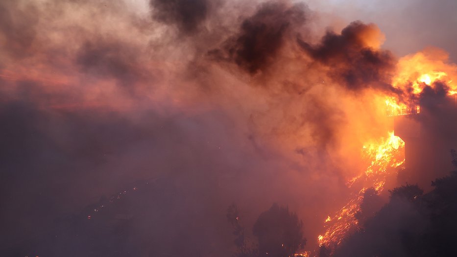 Image of a large fire with a smoke plume