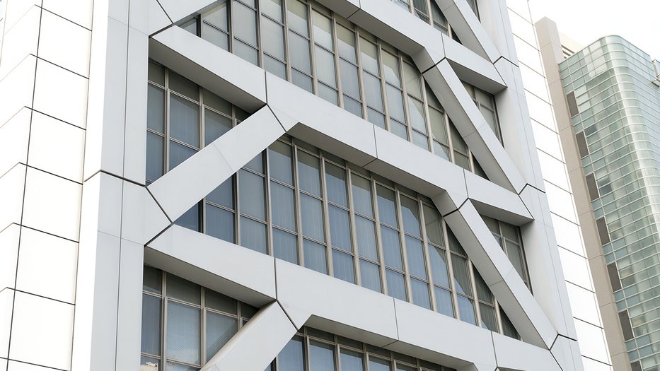 Close-up of a tall building with earthquake-resistant reinforcement in Japan
