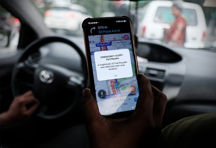 An earthquake early warning system on a phone in a car