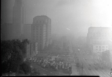Black and white photo of hazy air in a city