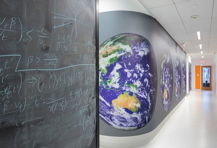 An image of a chalkboard and wall inside the Resnick Sustainability Institute building