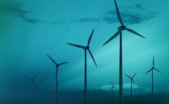 Wind turbines at sunset