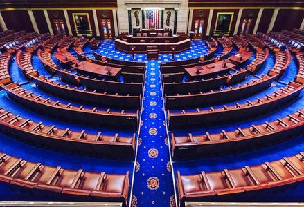 Wide-angle view of an empty US House of Representatives chamber at the US Capitol in Washington, D.C.