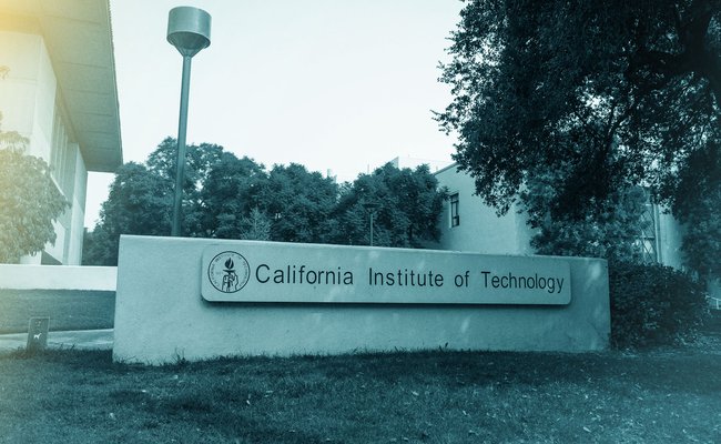 Filtered photo of an entrance to Caltech's campus with a sign that says California Institute of Technology