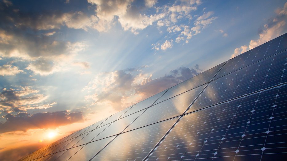 a solar panel at sunset