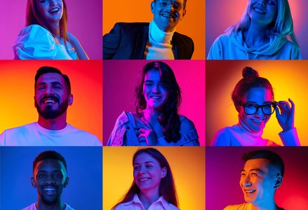 A vibrant collage of diverse individuals smiling and laughing, illuminated by colorful gradient lighting.