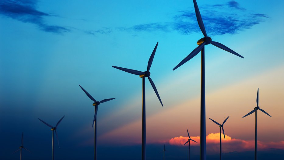 Wind turbines at sunset