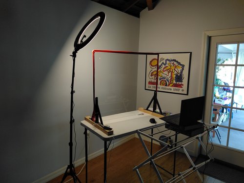 set up lightboard teaching solution with glass, table, and chair