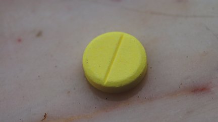 A yellow pill