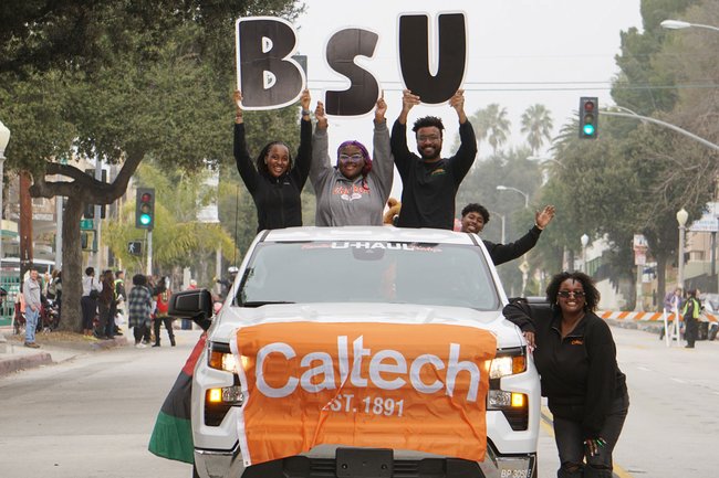 The Black Student Union holding a "BSU" sign in Pasadena's Black History Month Parade.